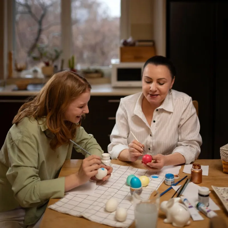 Support worker helping a participant prepare a meal in the kitchen