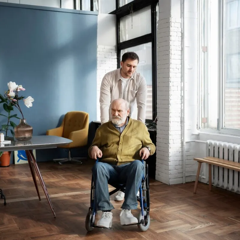 Support worker having a friendly conversation with a participant at home